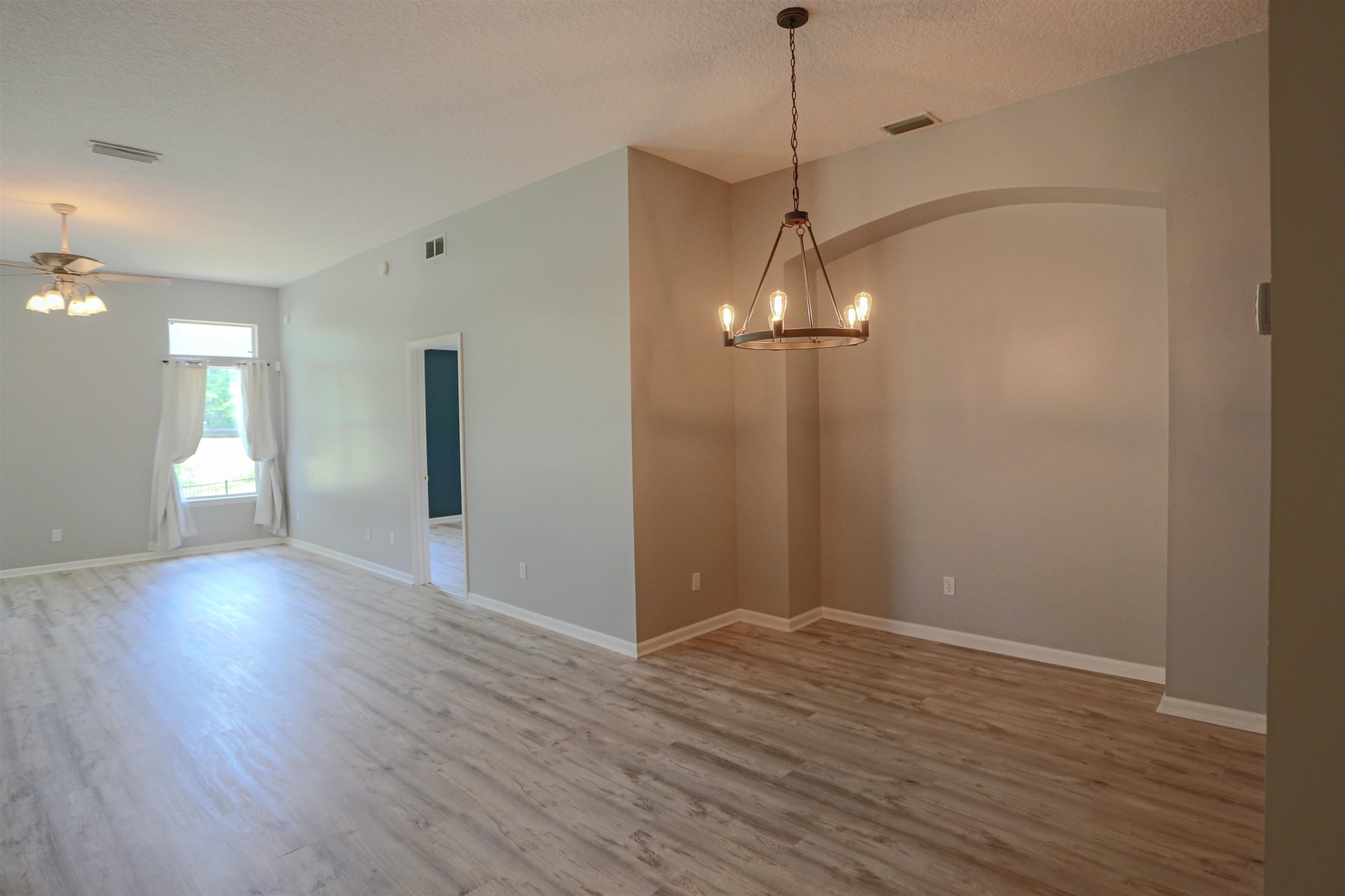 1768 Keswick Road St. Augustine, FL 32084 - Photo 8 of 30 a view of empty room with wooden floor
