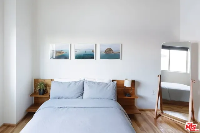 a view of a balcony with table and chairs