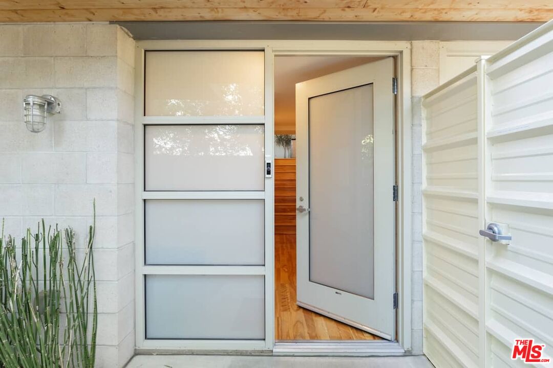 530 North Larchmont Boulevard, Unit 4 Los Angeles, CA 90004 - Photo 17 of 18 a view of a walk in closet and wooden floor