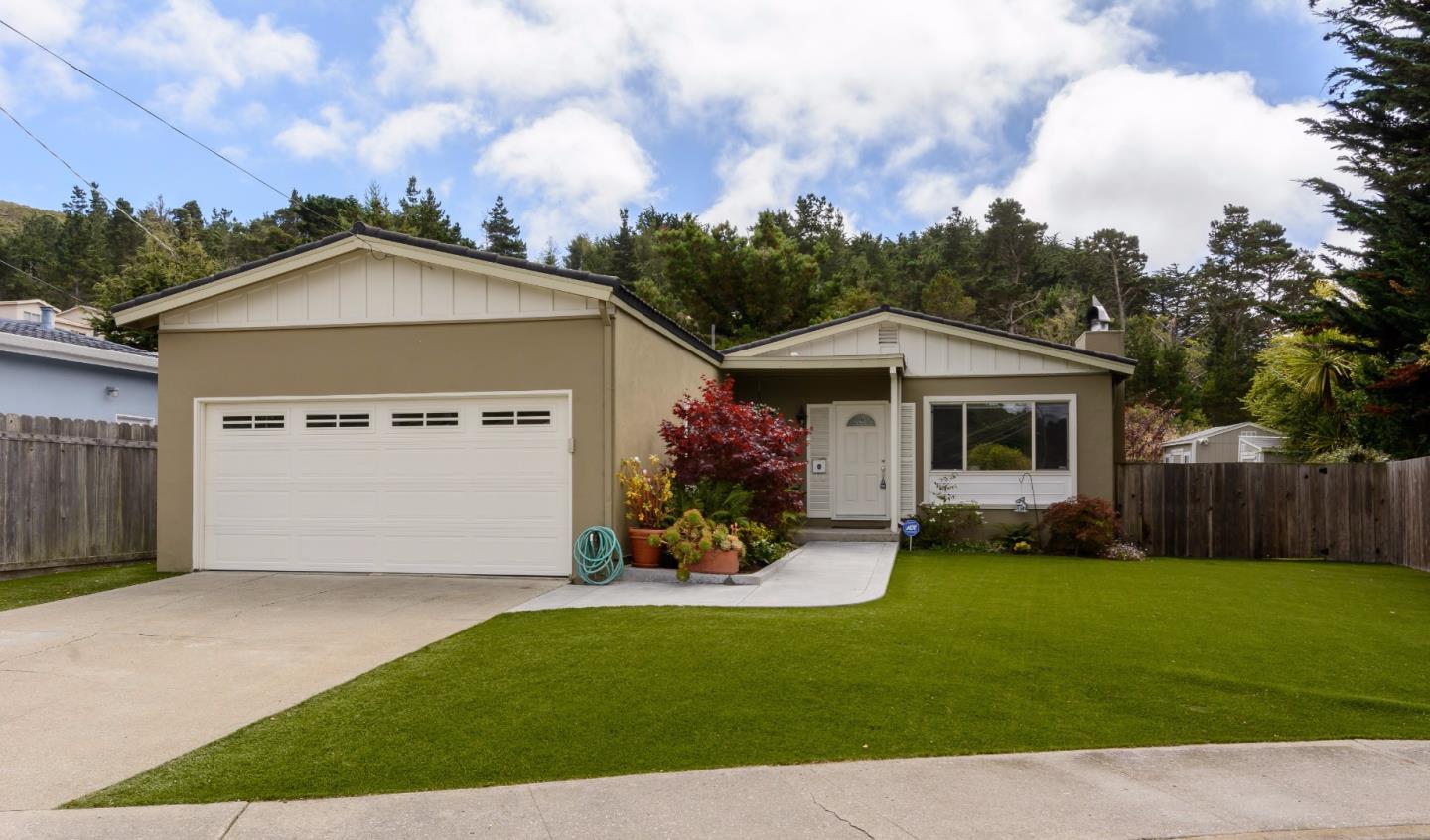 416 Cullen Road Pacifica, CA 94044 - Photo 1 of 18 a front view of house with yard and green space