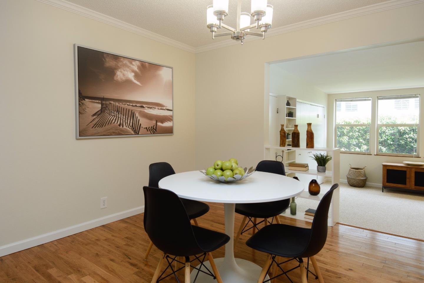 416 Cullen Road Pacifica, CA 94044 - Photo 7 of 18 a view of a dining room with furniture window and wooden floor