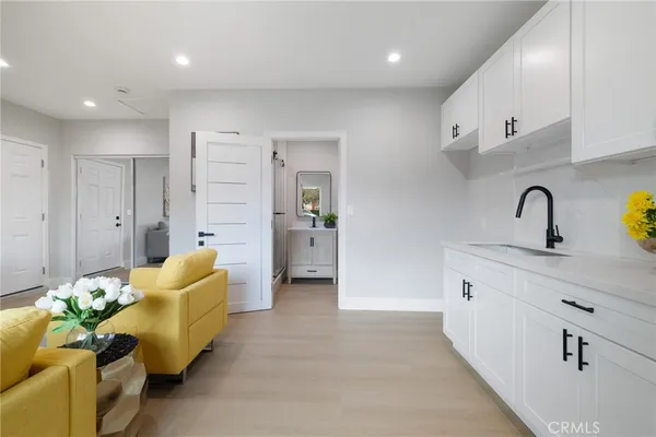 a spacious bathroom with a sink and a shower