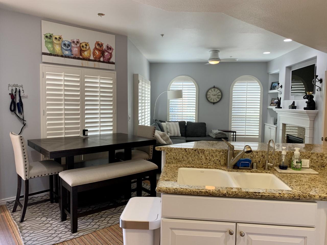 45245 Seeley Drive, Unit 15F La Quinta, CA 92253 - Photo 8 of 12 Billy kitchen and LR 1