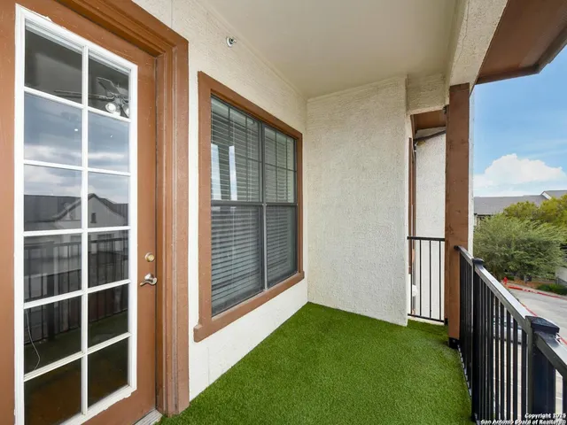 a view of front door and deck