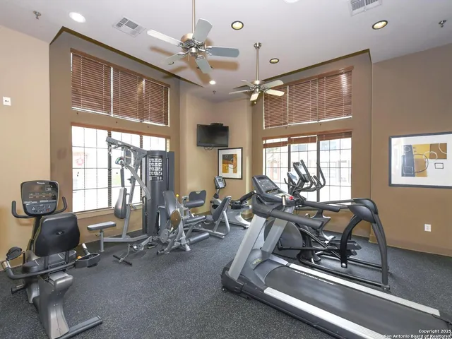 a view of a room with gym equipment