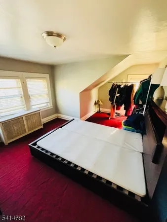 a living room with a couch and a flat screen tv