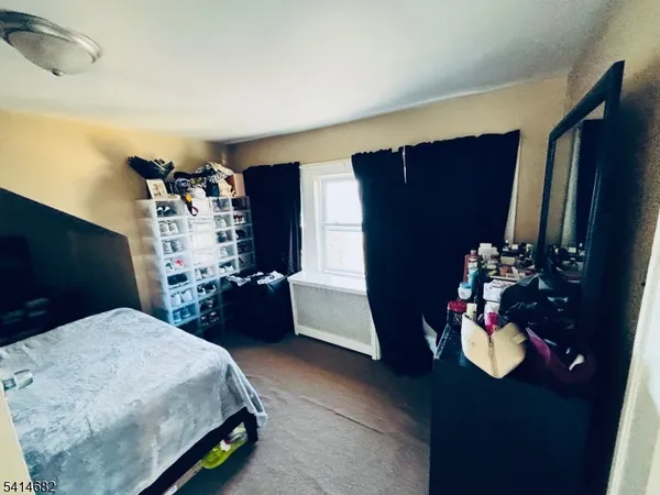 a view of livingroom with furniture and a window