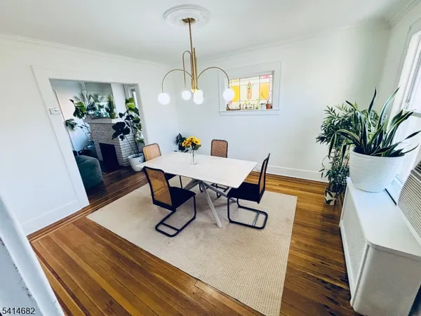 a kitchen with a sink stainless steel appliances and counter space