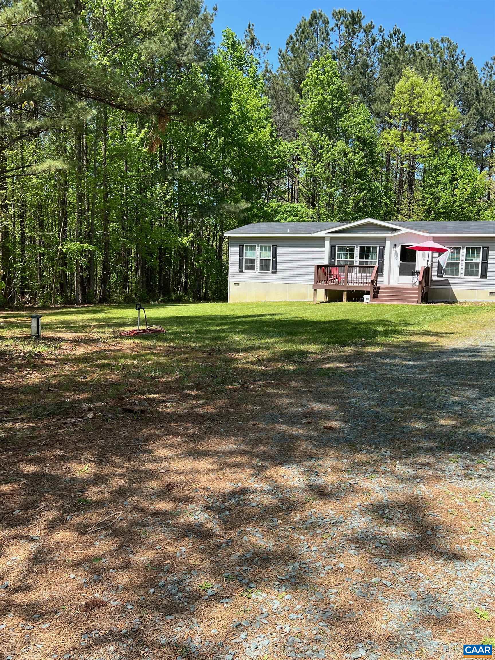 1261 Miles Jackson Road Palmyra, VA 22963 - Photo 28 of 40 a front view of a house with a garden
