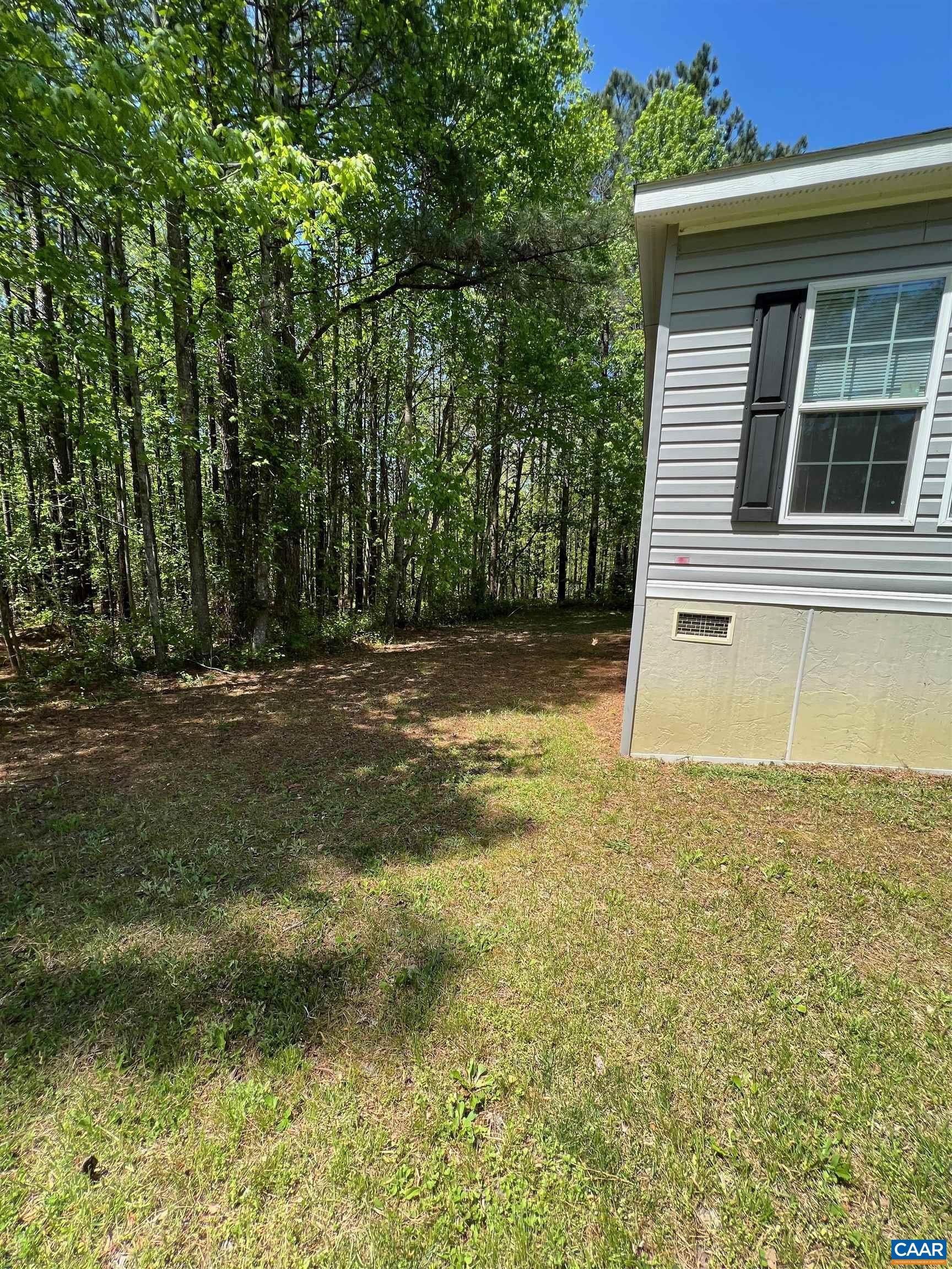1261 Miles Jackson Road Palmyra, VA 22963 - Photo 29 of 40 a view of a yard with an outdoor space