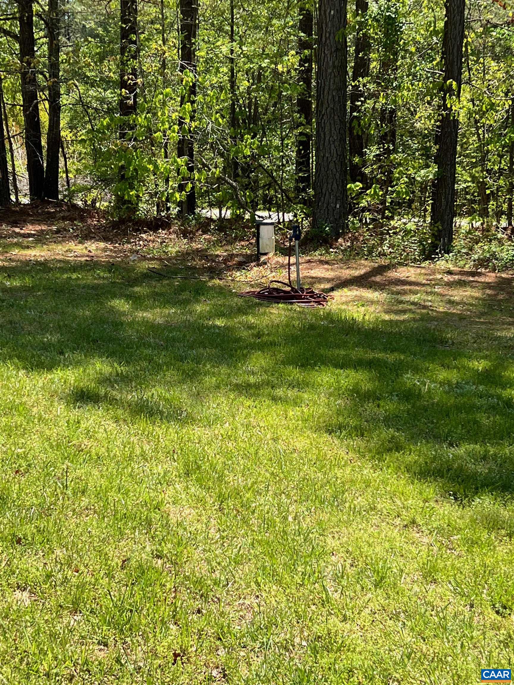 1261 Miles Jackson Road Palmyra, VA 22963 - Photo 36 of 40 a view of swimming pool with a bench