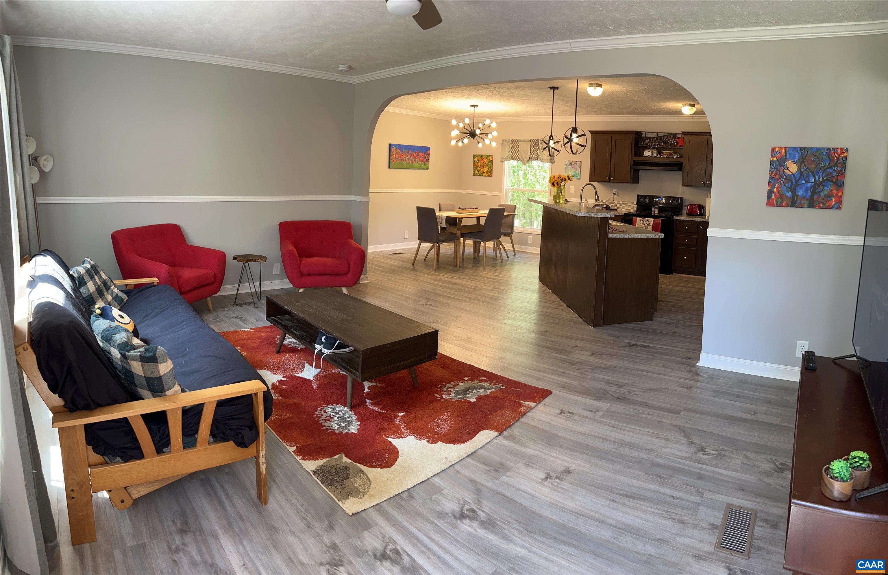 1261 Miles Jackson Road Palmyra, VA 22963 - Photo 7 of 40 a living room with furniture rug and wooden floor