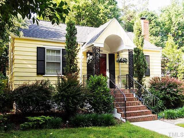 2811 Barmettler Street Raleigh, NC 27607 - Photo 1 of 22 a front view of a house with garden