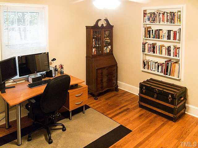 2811 Barmettler Street Raleigh, NC 27607 - Photo 16 of 22 a view of a workspace with furniture and a window