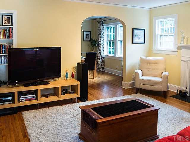 2811 Barmettler Street Raleigh, NC 27607 - Photo 8 of 22 a living room with furniture and flat screen tv