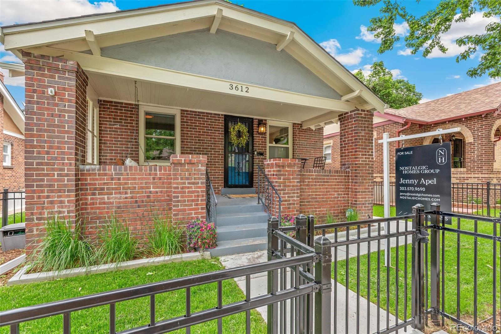 3612 Perry Street Denver, CO 80212 - Photo 3 of 50 a front view of a house with a porch