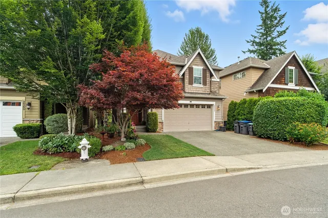 front view of a house with a yard