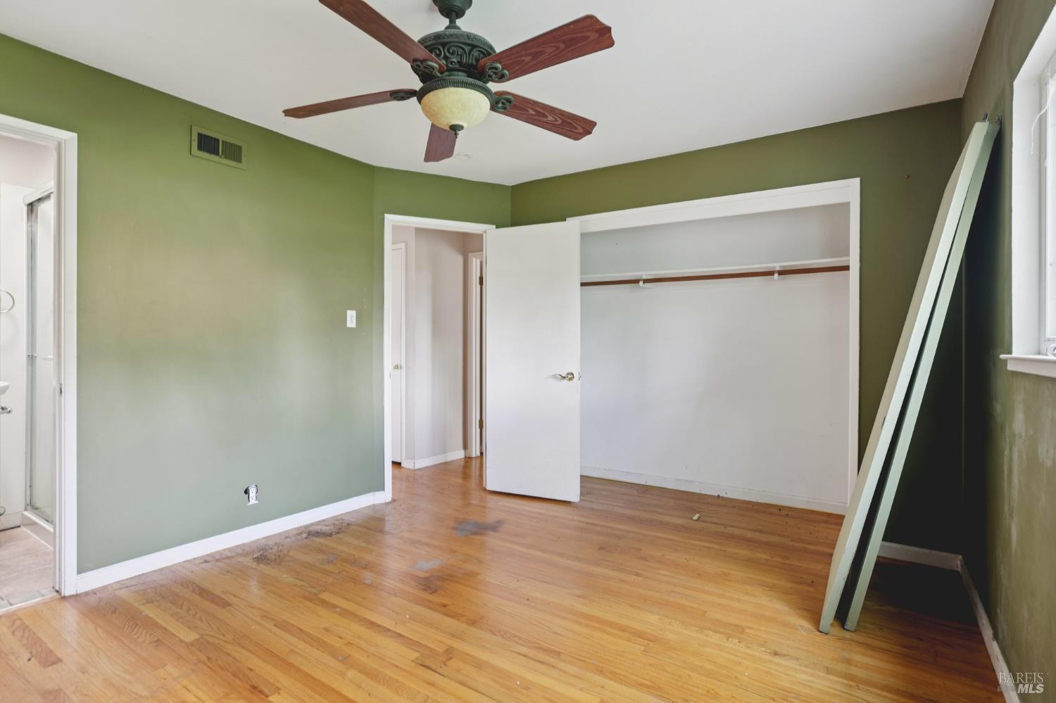 1023 Avondale Lane Hayward, CA 94545 - Photo 17 of 24 a view of empty room with wooden floor
