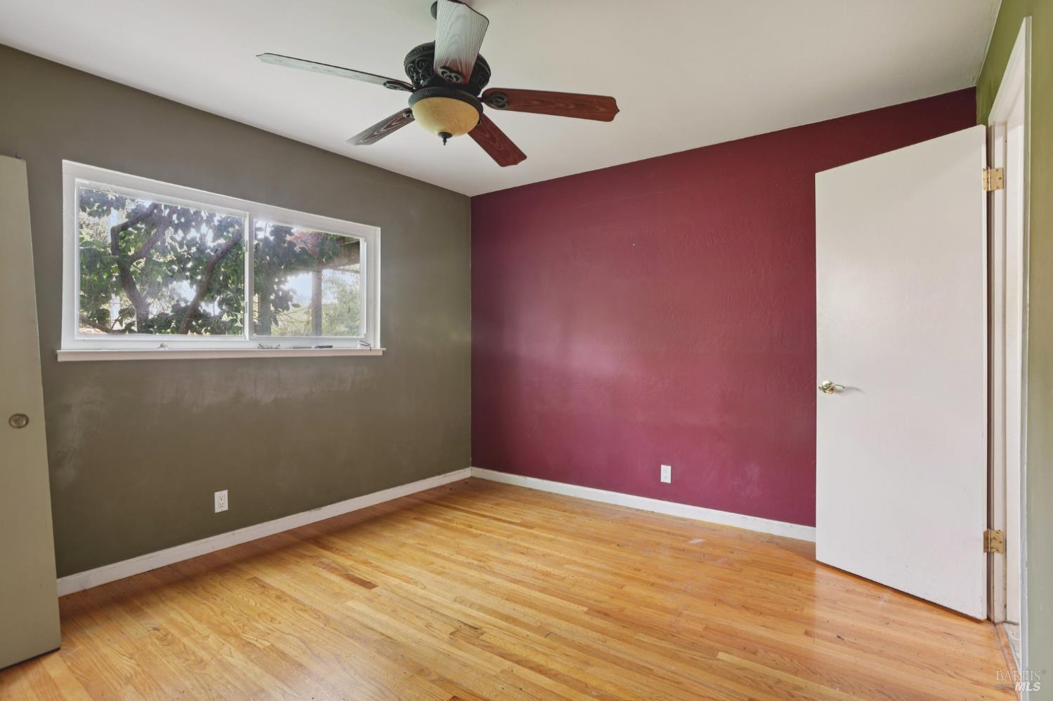 1023 Avondale Lane Hayward, CA 94545 - Photo 18 of 24 a view of empty room with wooden floor