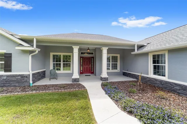 a view of a livingroom with furniture and window