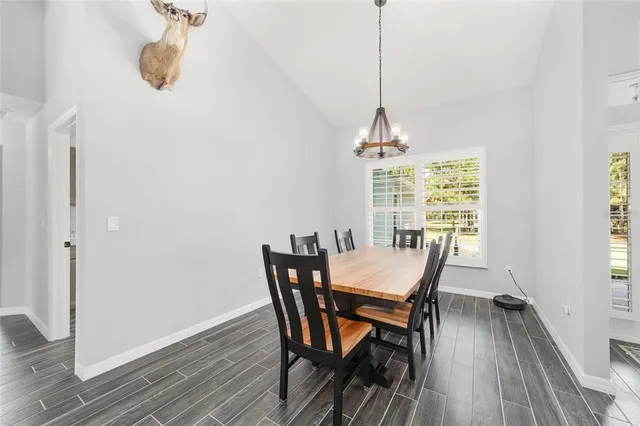 a spacious bathroom with a shower and a sink
