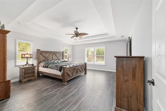 a view of a patio with a table chairs and a table