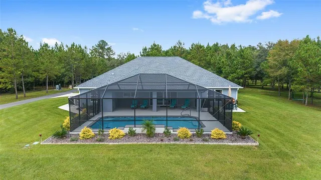 a view of a hallway view with wooden floor and furniture