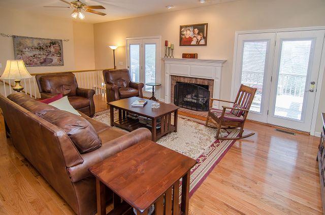 500 Fairway Trail Springfield, TN 37172 - Photo 6 of 19 Beautiful Gas fireplace perfect for these cold nights. Oak Hardwood floors throughout Main level. 2 sets of New Patio doors with internal blinds giving access to Large deck.