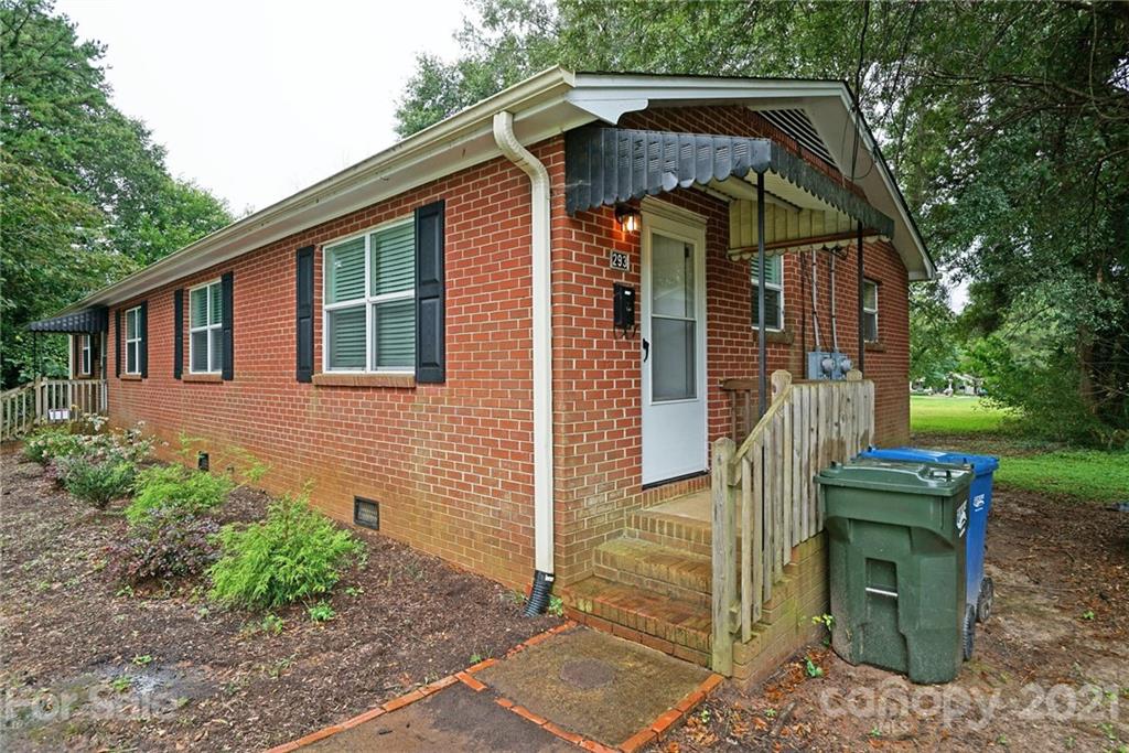 291 9th Avenue Northwest Hickory, NC 28601 - Photo 1 of 7 a front view of a house with garden