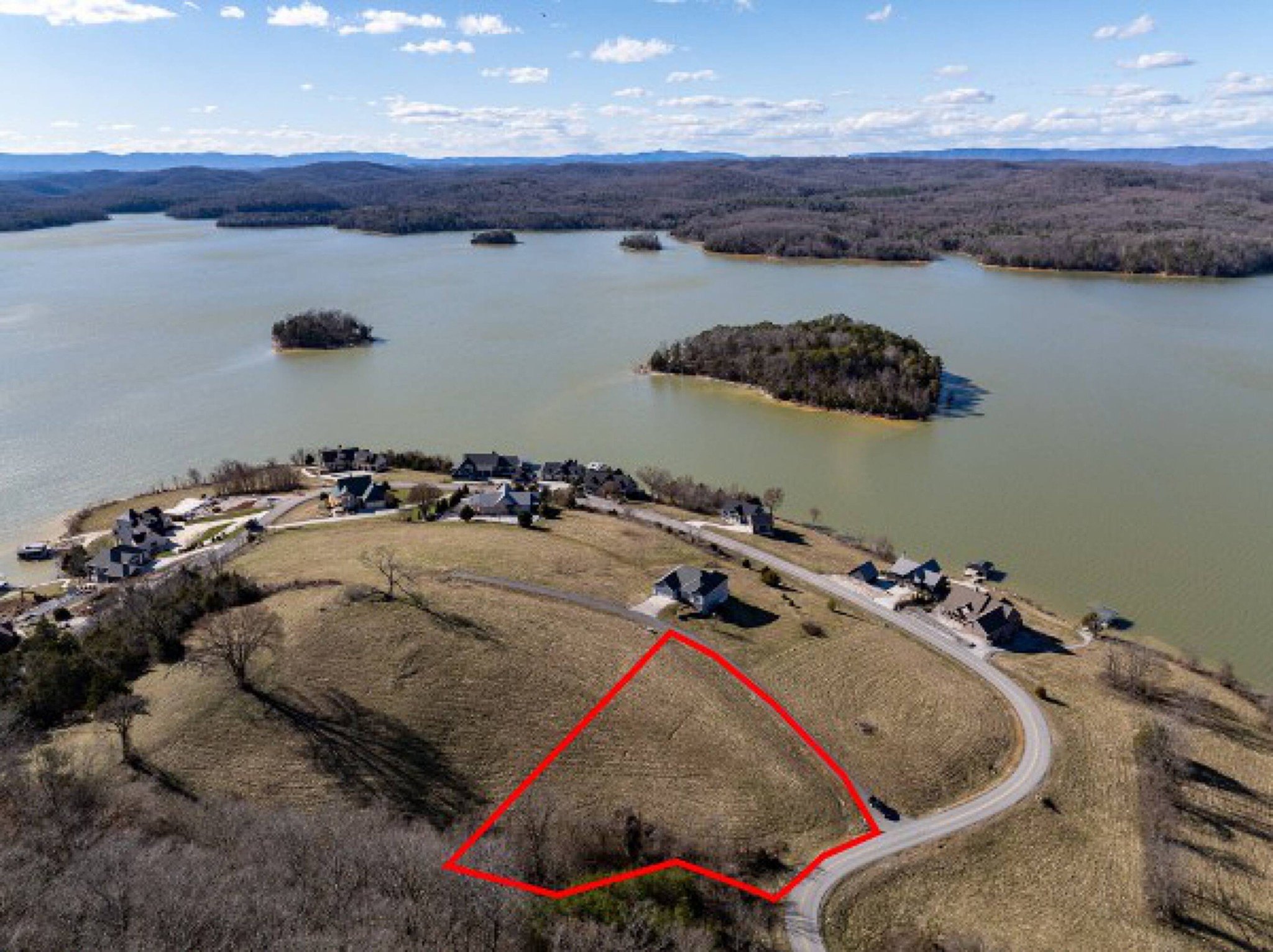 0 Russell Brothers Road Sharps Chapel, TN 37866 - Photo 5 of 9 a bed with a small white comforter and pillows