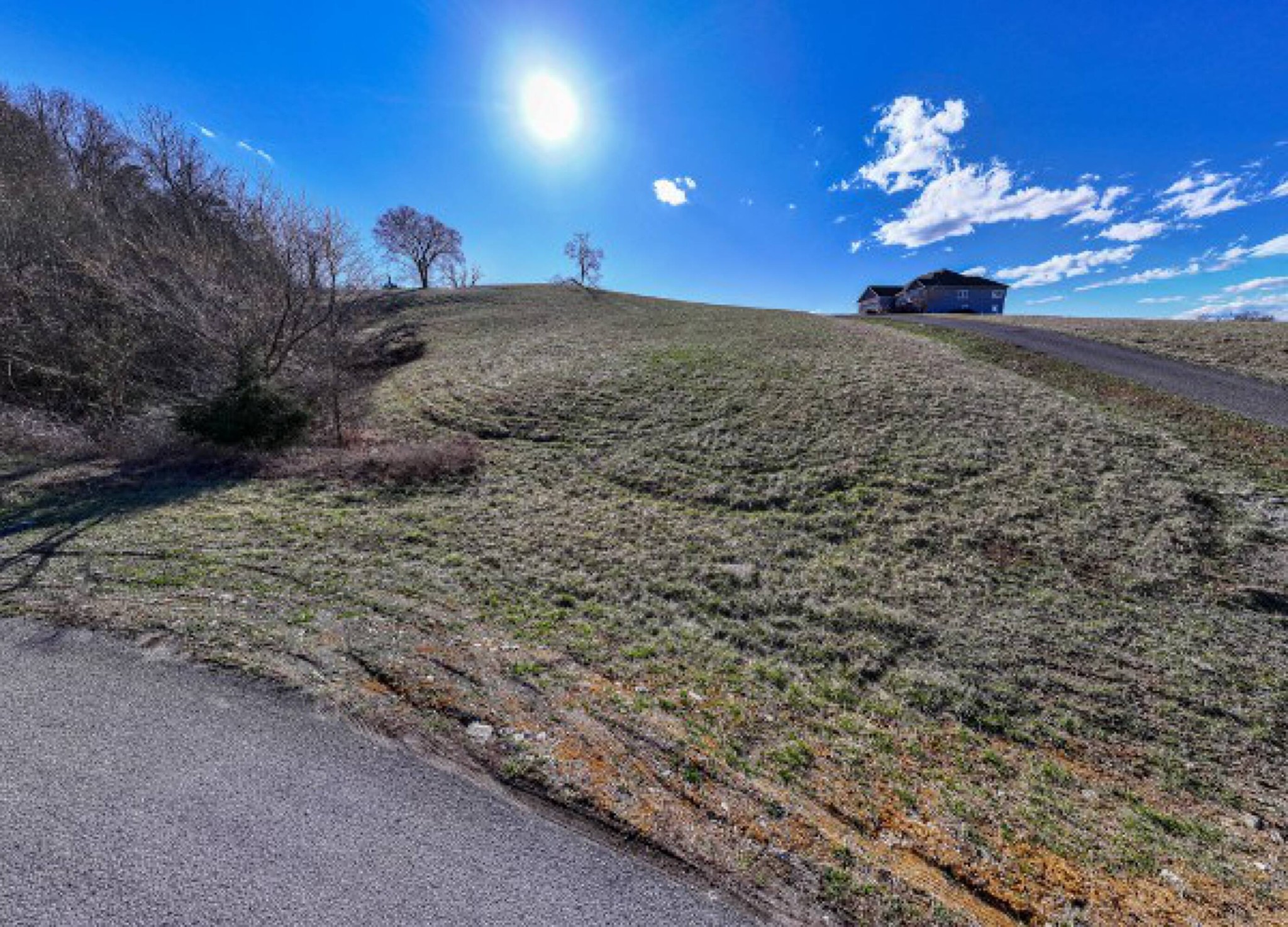 0 Russell Brothers Road Sharps Chapel, TN 37866 - Photo 7 of 9 a view of a backyard of a house