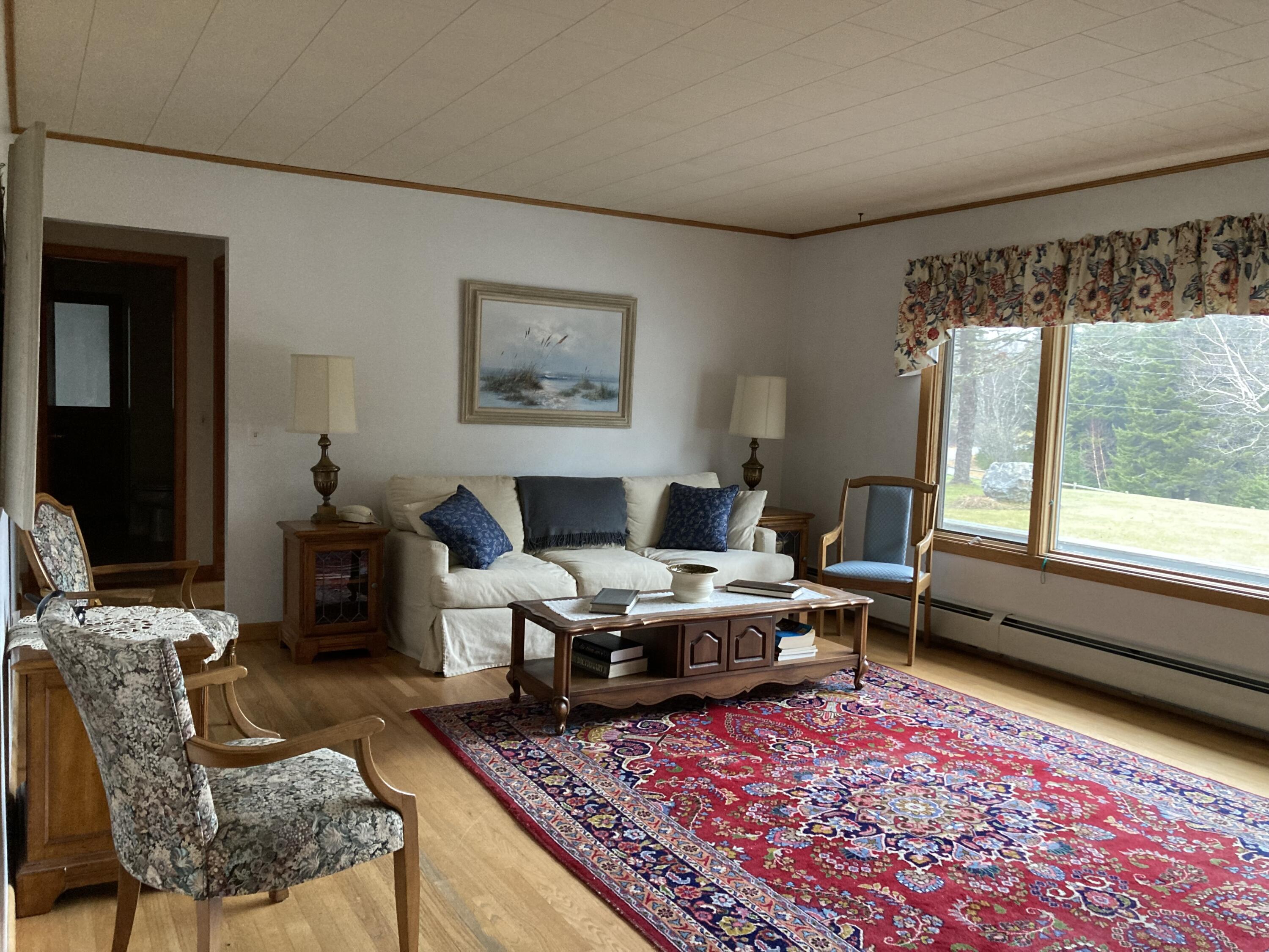 1 Francis Road Steuben, ME 04680 - Photo 9 of 30 Formal living room facing bay.
