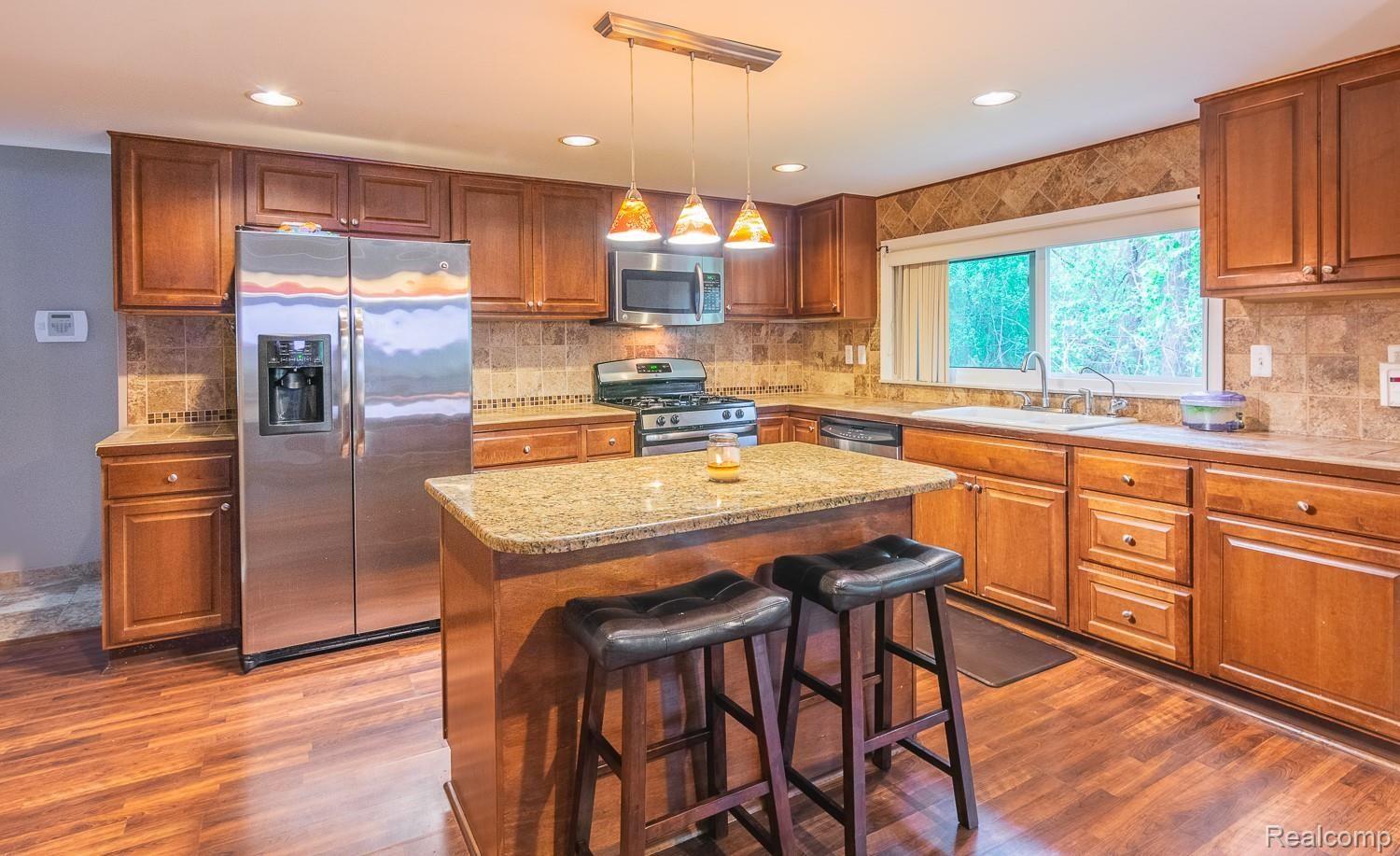 219 Barrington Road Bloomfield Hills, MI 48302 - Photo 9 of 30 Island kitchen with stainless appliances