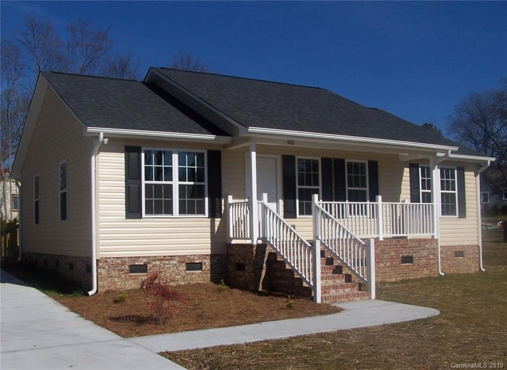 400 Rowan Mill Road Salisbury, NC 28147 - Photo 2 of 24 a front view of a house with a garden