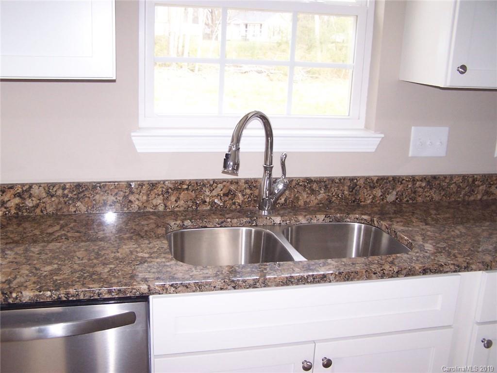 400 Rowan Mill Road Salisbury, NC 28147 - Photo 11 of 24 a close view of sink and tap