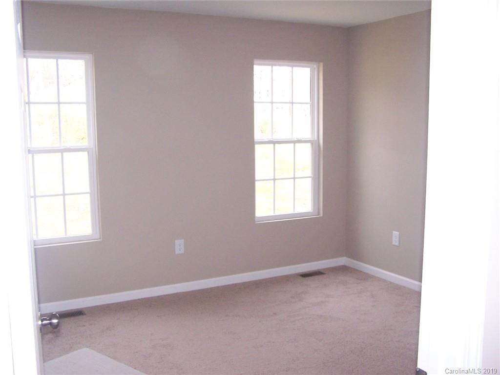 400 Rowan Mill Road Salisbury, NC 28147 - Photo 13 of 24 an empty room with a window