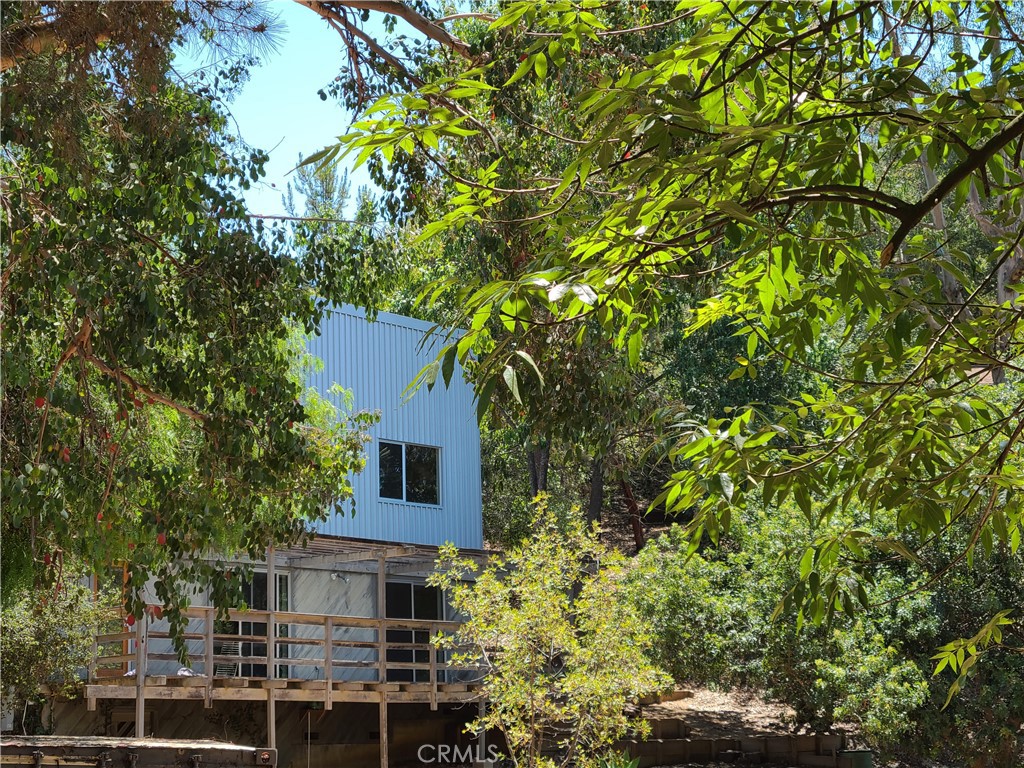 243 Amy Way Topanga, CA 90290 - Photo 19 of 31 a view of a house with a tree