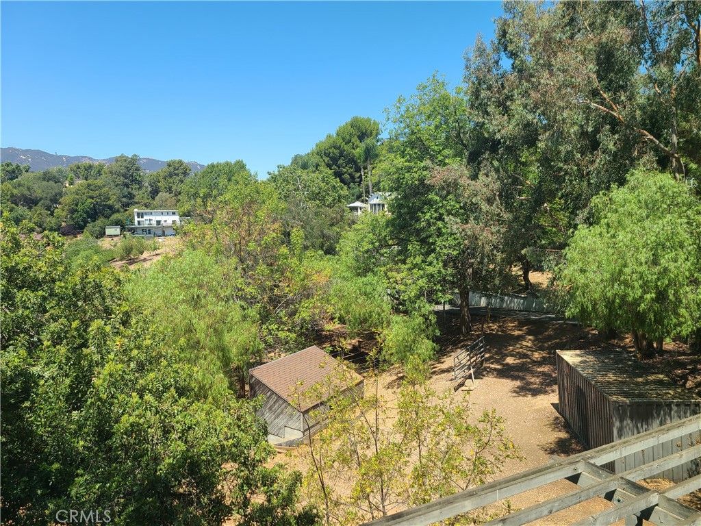 243 Amy Way Topanga, CA 90290 - Photo 20 of 31 a view of a lake with houses