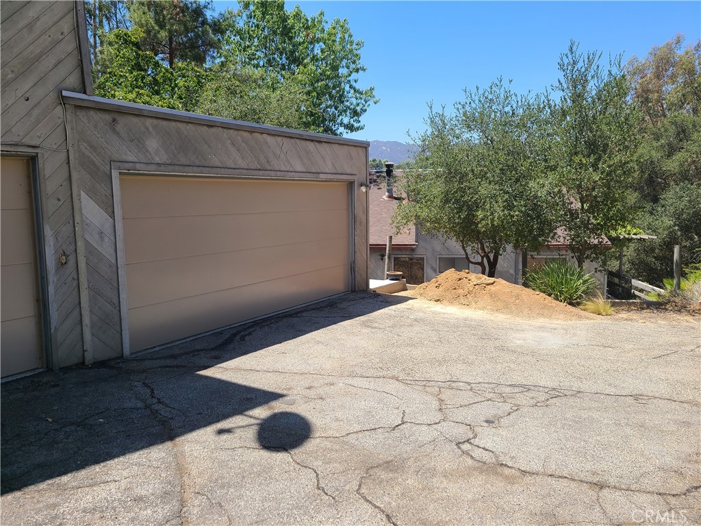 243 Amy Way Topanga, CA 90290 - Photo 27 of 31 a view of backyard and tree
