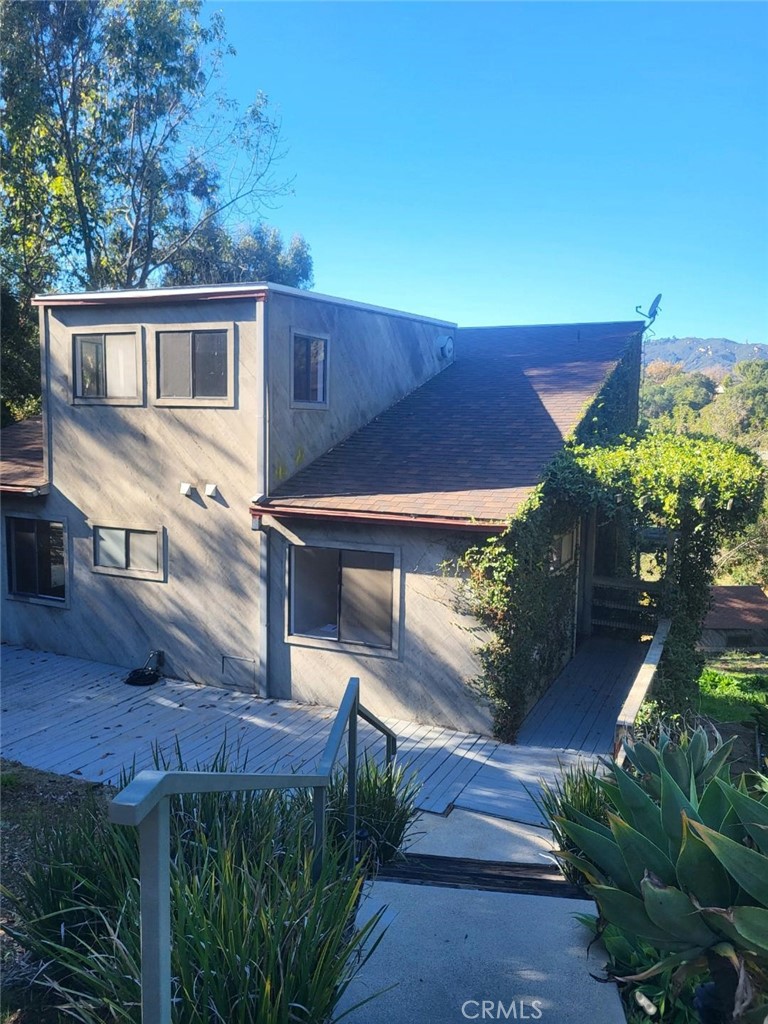 243 Amy Way Topanga, CA 90290 - Photo 29 of 31 a front view of a house with garden