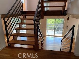 243 Amy Way Topanga, CA 90290 - Photo 30 of 31 a view of staircase with a rug