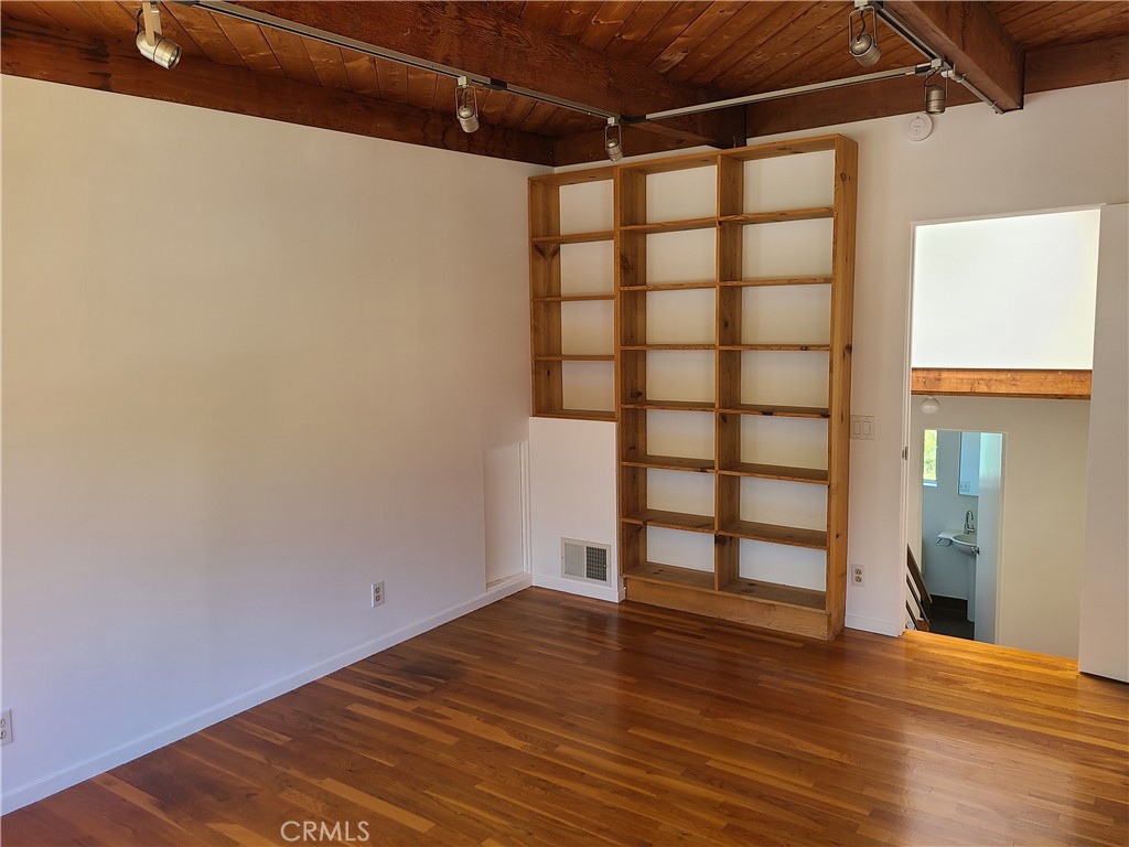 243 Amy Way Topanga, CA 90290 - Photo 5 of 31 a view of empty room with wooden floor