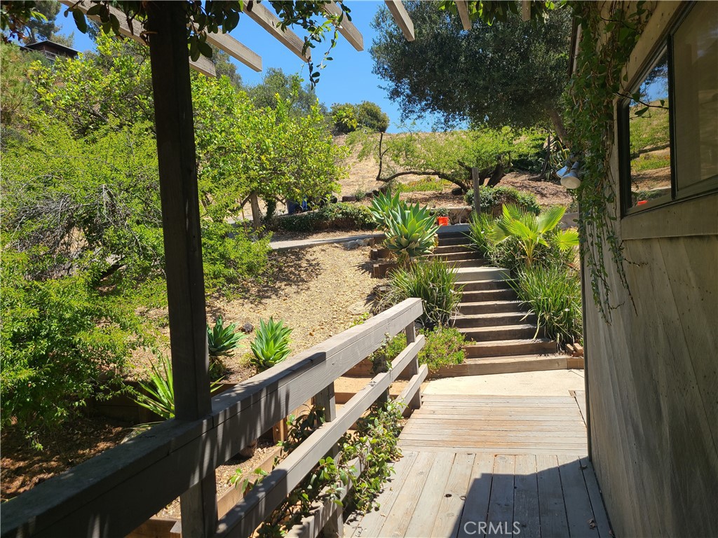 243 Amy Way Topanga, CA 90290 - Photo 10 of 31 a view of a balcony with wooden floor