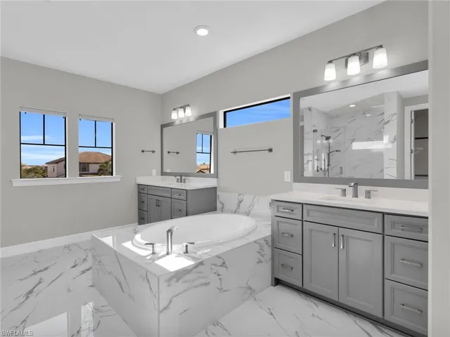 a kitchen with a sink cabinets and window