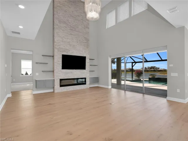 a view of a livingroom with furniture and a flat screen tv