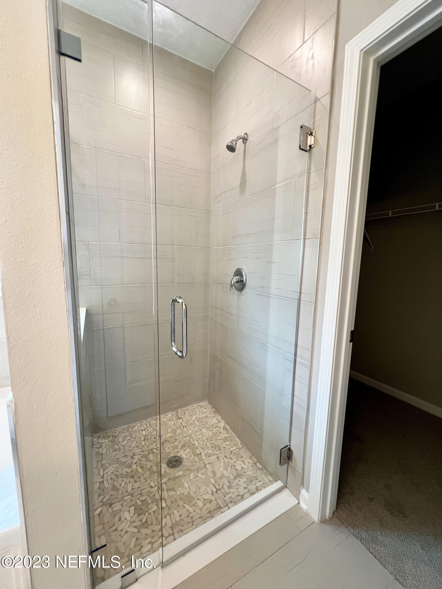 385 Brookgreen Way St. Augustine, FL 32092 - Photo 18 of 32 a bathroom with a granite countertop shower