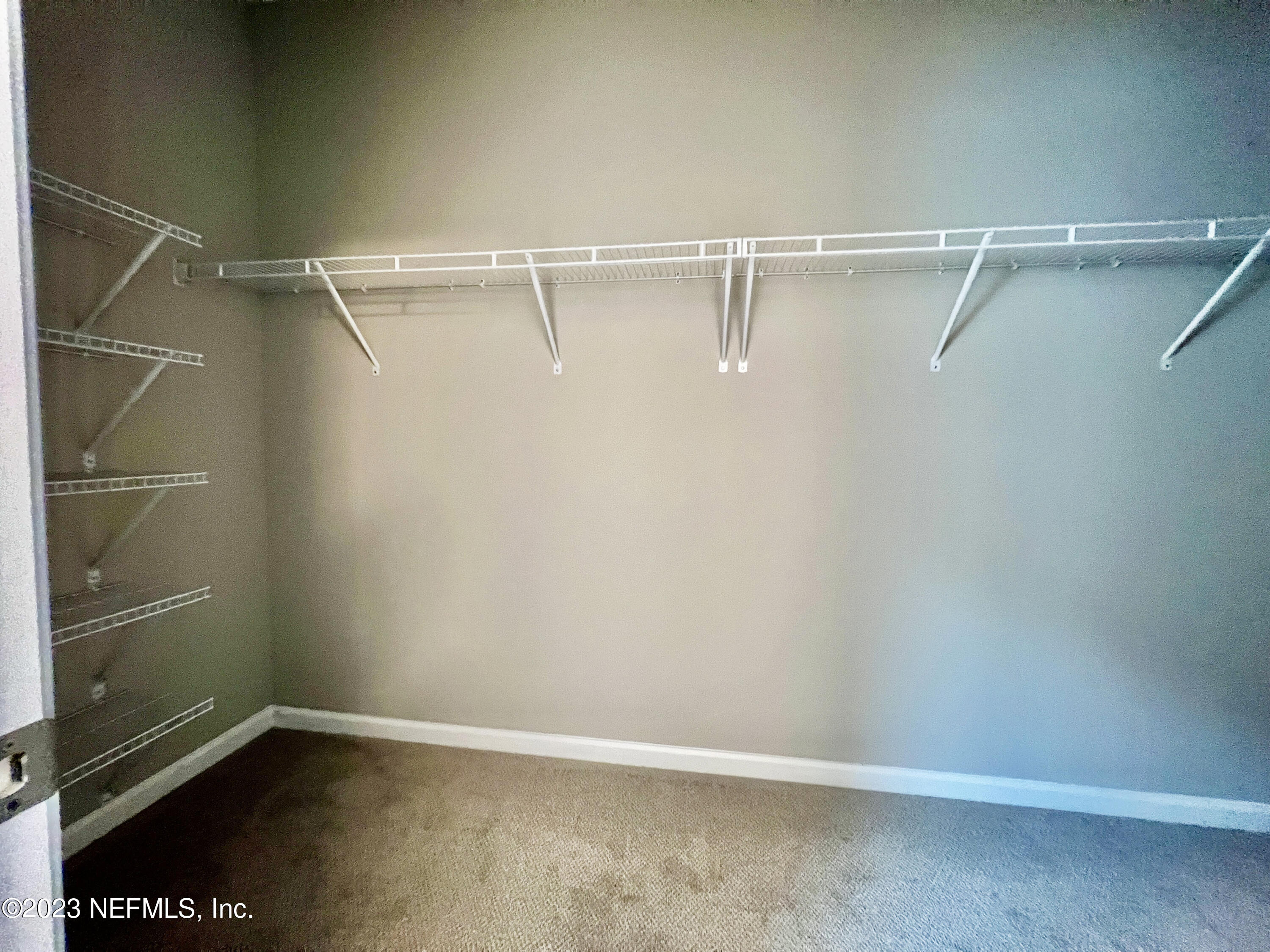 385 Brookgreen Way St. Augustine, FL 32092 - Photo 20 of 32 a view of an empty walk in closet