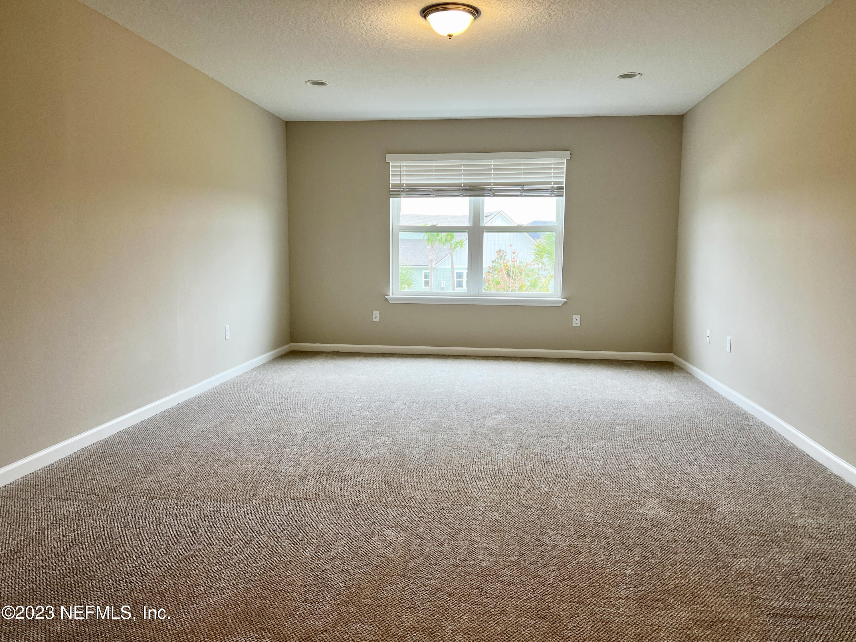 385 Brookgreen Way St. Augustine, FL 32092 - Photo 26 of 32 an empty room with a window
