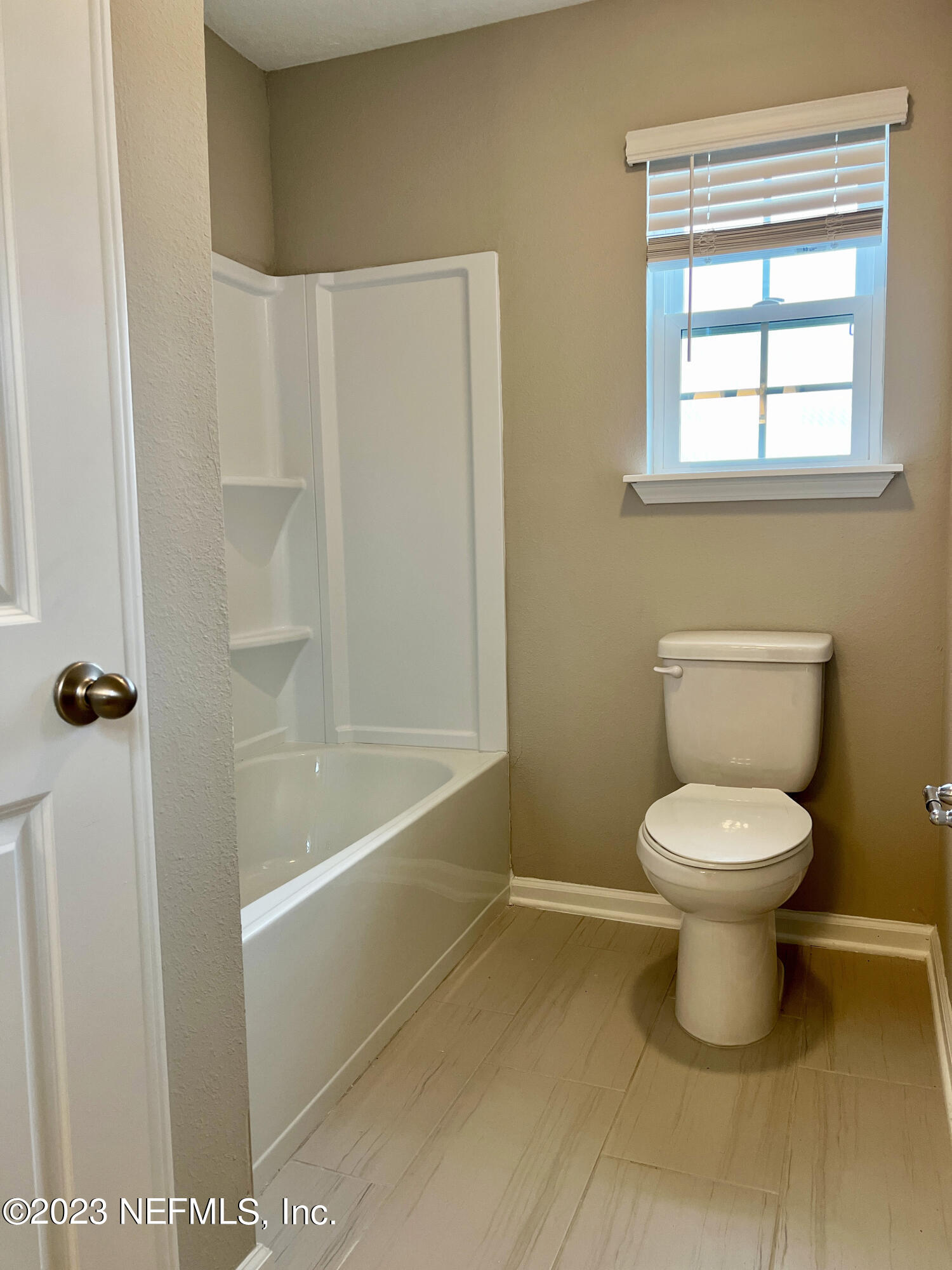 385 Brookgreen Way St. Augustine, FL 32092 - Photo 27 of 32 a bathroom with a toilet and a shower