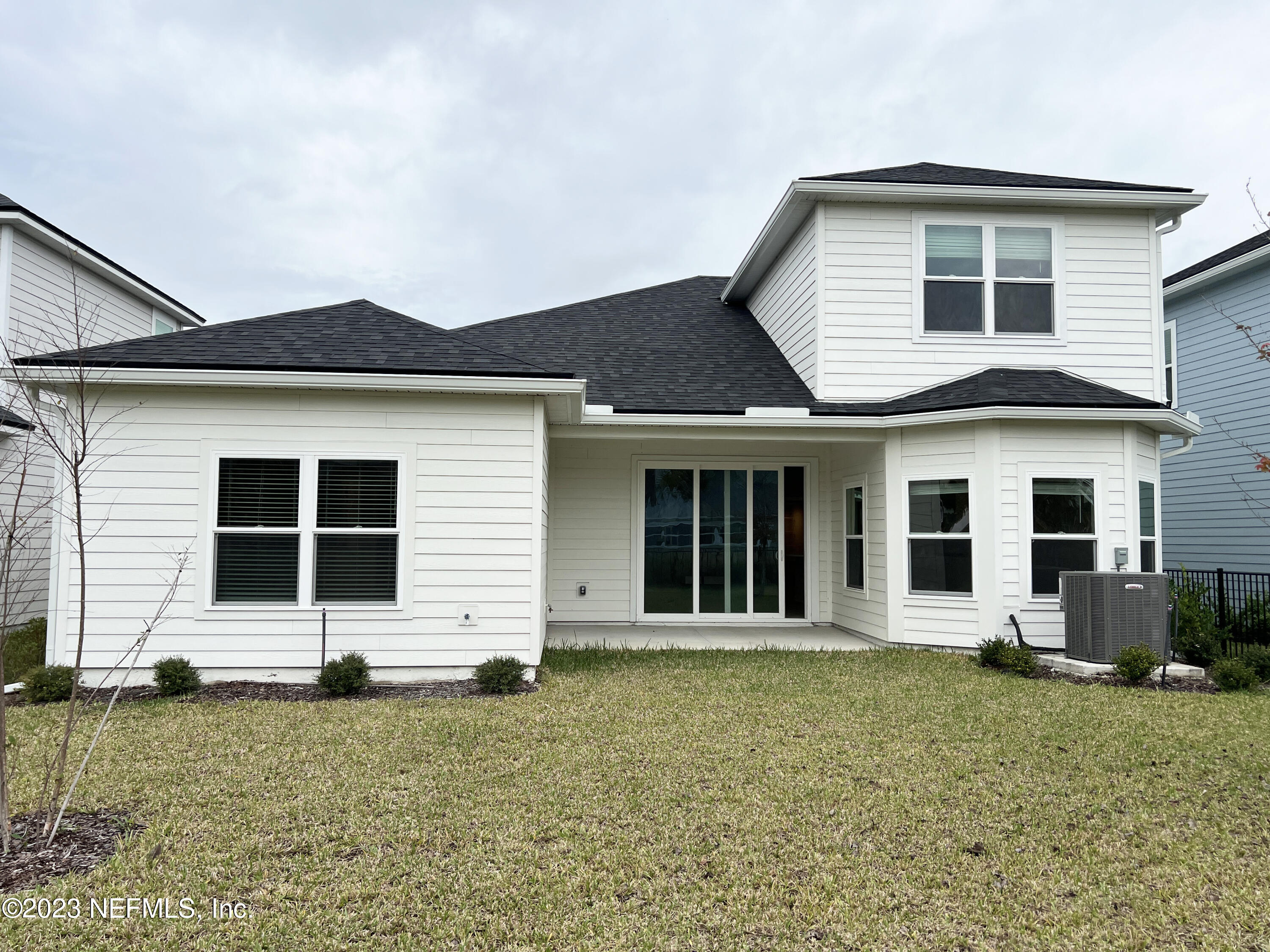 385 Brookgreen Way St. Augustine, FL 32092 - Photo 28 of 32 front view of a house with a yard